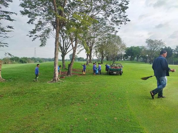 Northern Rangsit Golf Club 8 people people standing tree sky and grass Northern Rangsit Golf Club 8 people people standing tree sky and grass