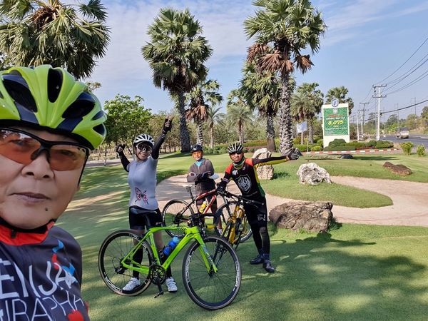 สนามกอล์ฟ กบินทร์บุรี สปอร์ตคลับ Kbsc 4 people people standing bicycle and outdoors สนามกอล์ฟ กบินทร์บุรี สปอร์ตคลับ Kbsc 4 people people standing bicycle and outdoors