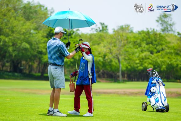 สนามกอล์ฟ กบินทร์บุรี สปอร์ตคลับ Kbsc 2 people people golfing golf cart golf course and text