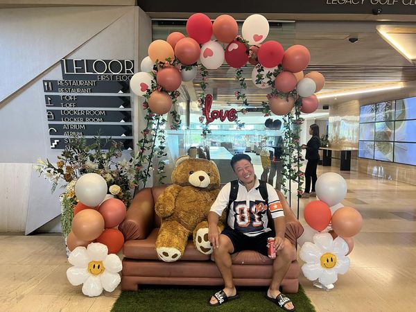Legacy Golf Club 2 people people standing balloon rose and indoor