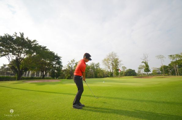 Thana City Country Club 1 person playing a sport and grass