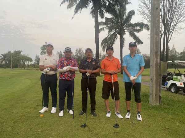 Legacy Golf Club 5 people people standing golf course and grass