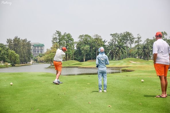 Summit Windmill Golf Club amp Residence 3 people people playing sports grass and Psstory