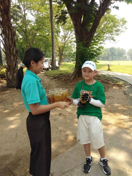 สนามกอล์ฟไดนาสตี้ แอนด์ คันทรีคลับ Dynasty Golf amp Country Club 2 people people standing and outdoors