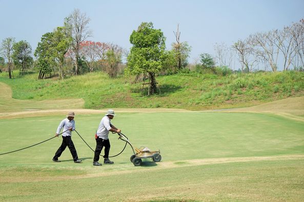 Nikanti Golf Club Nakhon Pathom 2 people people golfing and golf course