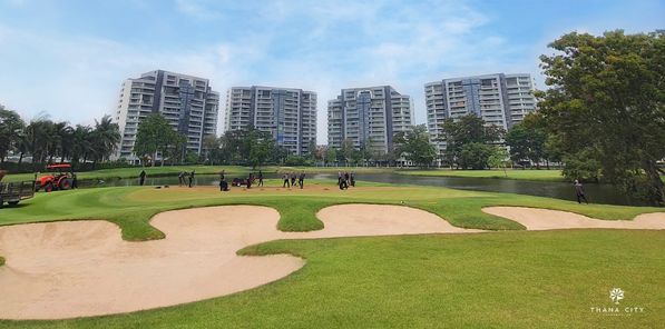 Thana City Country Club 6 people people golfing golf course and grass