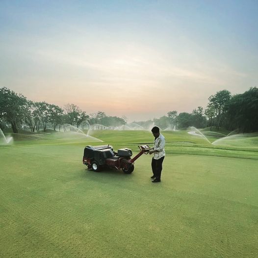 Alpine Golf Club 1 person golfing golf cart and golf course