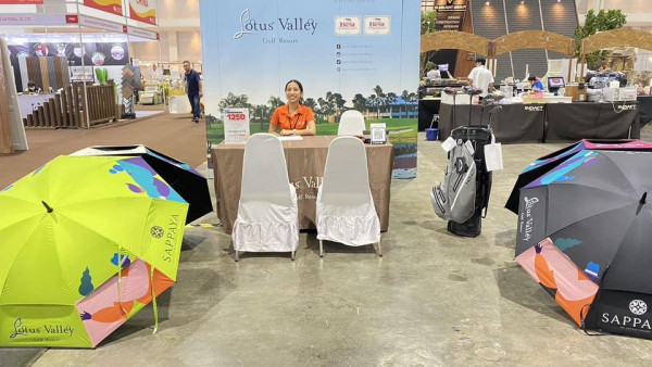 Lotus Valley Golf Resort 4 people and text