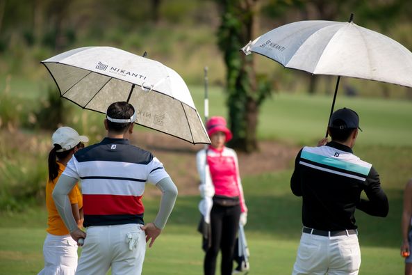 Nikanti Golf Club Nakhon Pathom 5 people people golfing golf course and text
