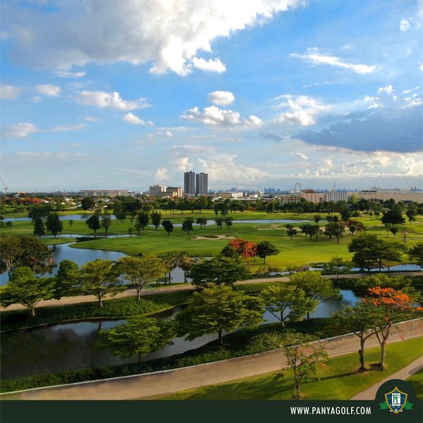 Panya Indra Golf Club 1 person golfing golf course and text
