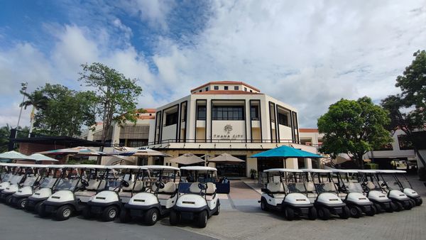 Thana City Country Club golf cart golf course and text