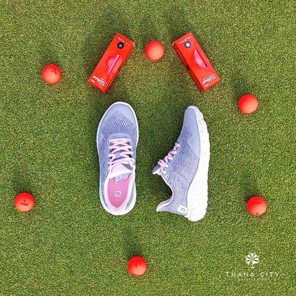Thana City Country Club golf tennis shoes golf course and text