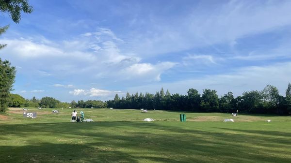 The Vintage Club 2 people people golfing and golf course