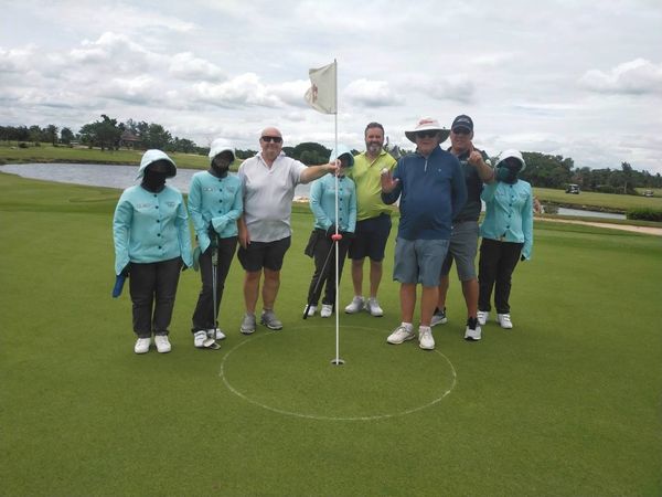 Bangpakong Riverside Country Club 7 people people golfing and golf course
