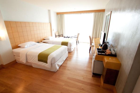Uniland Golf amp Resort Thailand เตียง ห้องนอน และ ในอาคาร