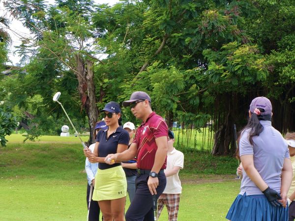 Muang Ake Golf Club 4 people people golfing and golf course