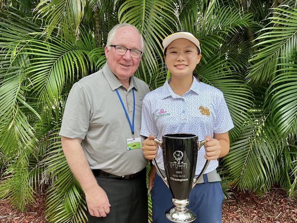 Thai Country Club 2 people people golfing golf course and text