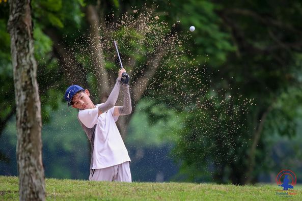 Lotus Valley Golf Resort 1 person golfing golf course and text