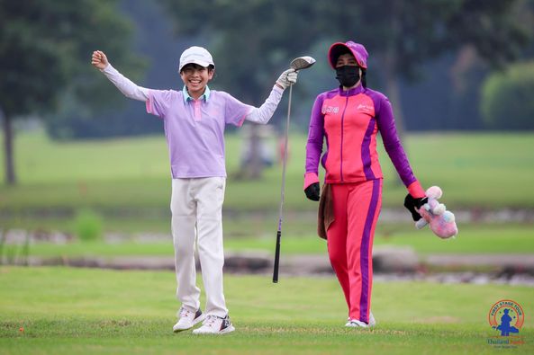 Lotus Valley Golf Resort 2 people people golfing golf course and text