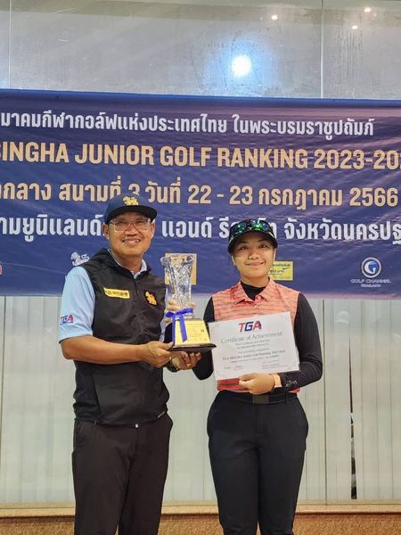 Krungthep Kreetha 2 people people golfing and text