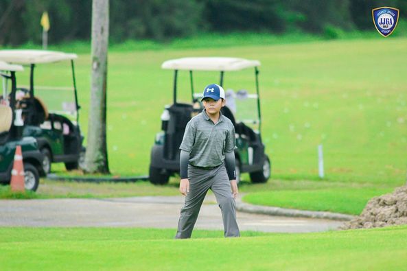 Lotus Valley Golf Resort 1 person golfing golf cart golf course and text