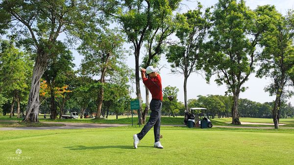 Thana City Country Club 1 person golfing golf course grass and tree