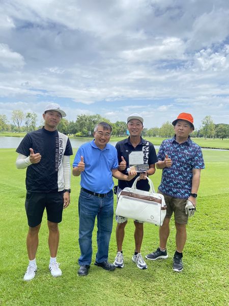 Flora Ville Golf amp Country Club 4 people people golfing golf course and text