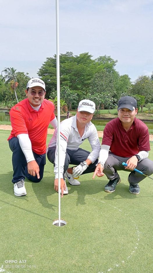 The Pine Golf Club 3 people people golfing golf course and text
