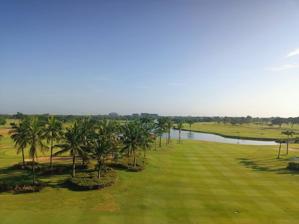 Bangpakong Riverside Country Club golf golf cart golf course and grass