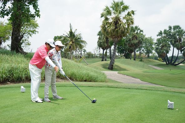Nikanti Golf Club Nakhon Pathom 2 people people golfing golf cart and golf course