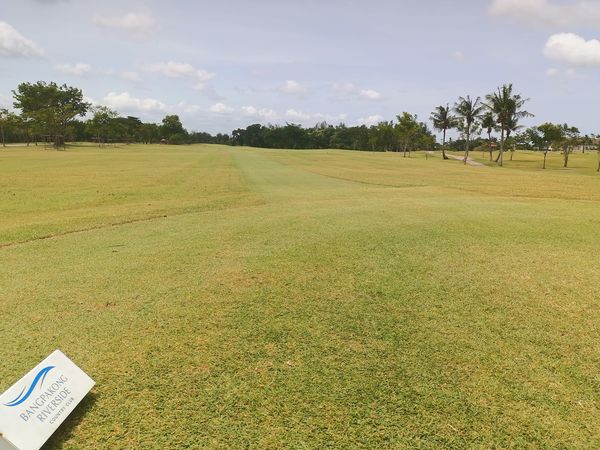 Bangpakong Riverside Country Club golf golf cart golf course and grass