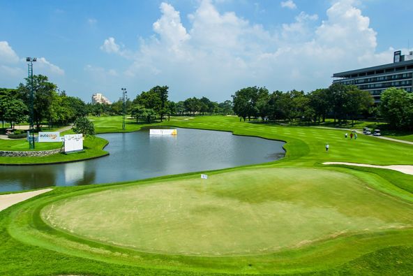 Bangkok Golf Club 1 person golfing golf course and text