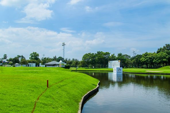 Bangkok Golf Club 1 person golfing grass and golf course