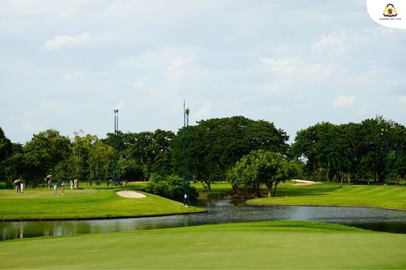 Bangkok Golf Club 5 people people golfing golf cart golf course and text