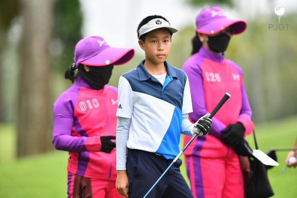 Lotus Valley Golf Resort 4 people people golfing golf course and text