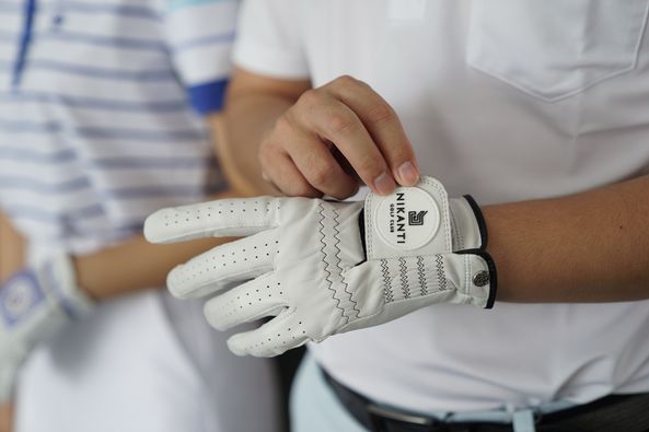 Nikanti Golf Club Nakhon Pathom 2 people people golfing and text
