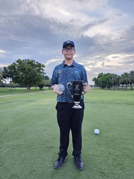 Bangpakong Riverside Country Club 1 person golfing and golf course
