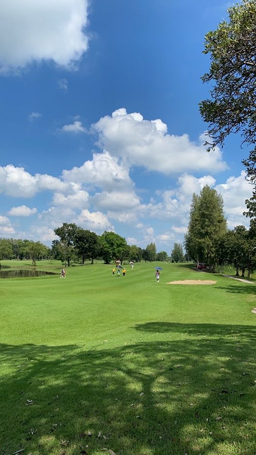 The Pine Golf Club 3 people people golfing and golf course