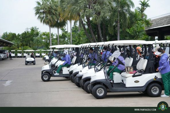 Panya Indra Golf Club 8 people people golfing golf cart golf course and text