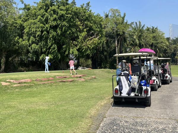 Summit Windmill Golf Club nbsp 3 people people golfing golf cart and golf course