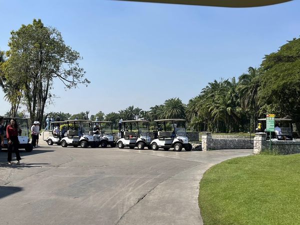 Summit Windmill Golf Club nbsp 4 people people golfing golf cart and golf course-2