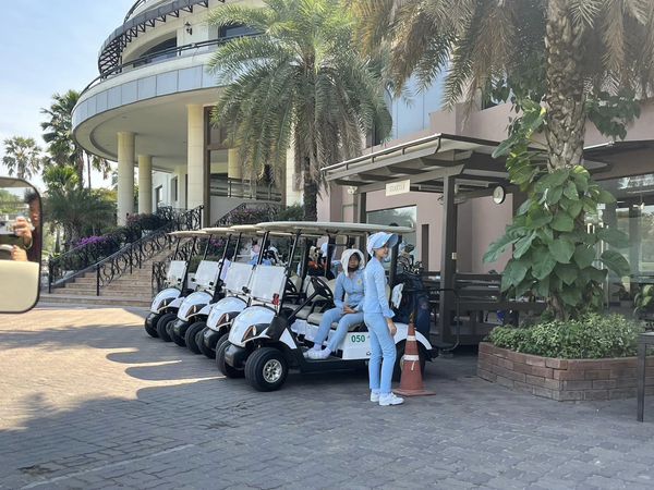 Summit Windmill Golf Club nbsp 4 people people golfing golf cart and golf course