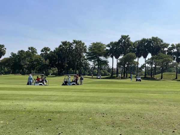 Summit Windmill Golf Club nbsp 4 people people golfing golf cart grass and golf course