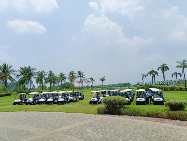 Bangpakong Riverside Country Club nbsp 4 people people golfing golf cart and golf course
