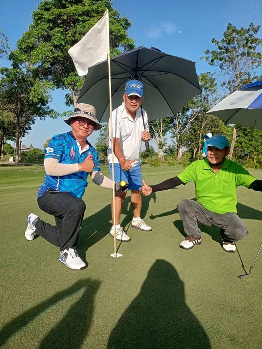 Gassan Legacy Golf Club 3 people people golfing golf cart golf course and text