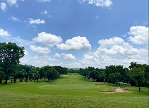 Chiangmai Inthanon Golf and Natural Resort 1 person golfing golf cart and golf course