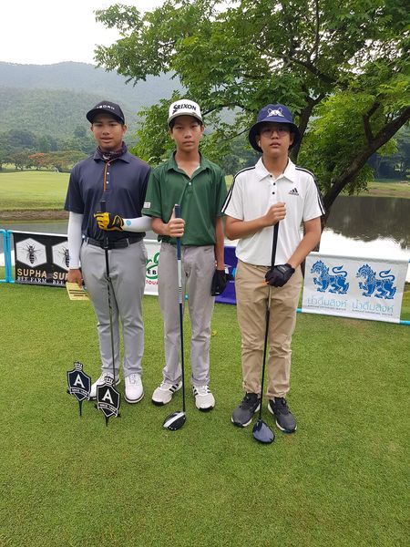 Alpinegolfresort Chiangmai 3 people people golfing golf course and text-4