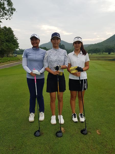 Alpinegolfresort Chiangmai 3 people people golfing golf course and text-5