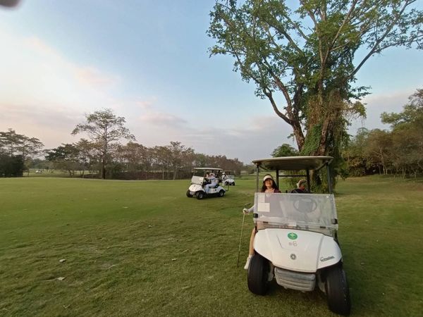 สนามกอล์ฟหริภุญชัย กอล์ฟคลับ 3 people people golfing golf cart and golf course