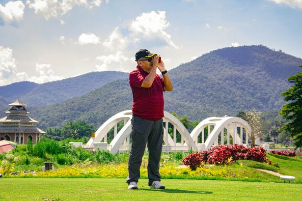 Gassan Khuntan Golf amp Resort Thailand 1 person and temple